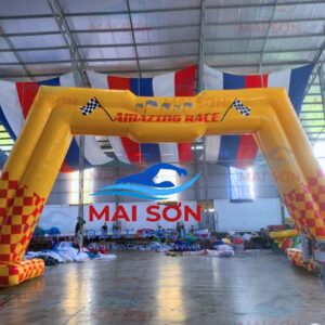 Cổng hơi cổng chào chữ M tự đứng màu vàng caro