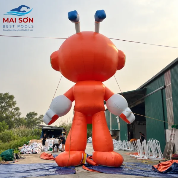Mascot Bơm Hơi Cao 9m Hình Linh Vật Kiến Sáng Biểu Tượng Của Hệ Thống FPT Schools