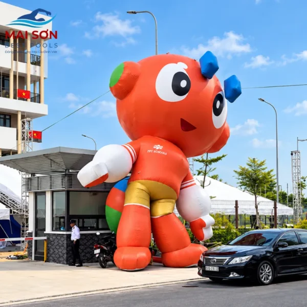 Mascot Bơm Hơi Cao 9m Hình Linh Vật Kiến Sáng Biểu Tượng Của Hệ Thống FPT Schools